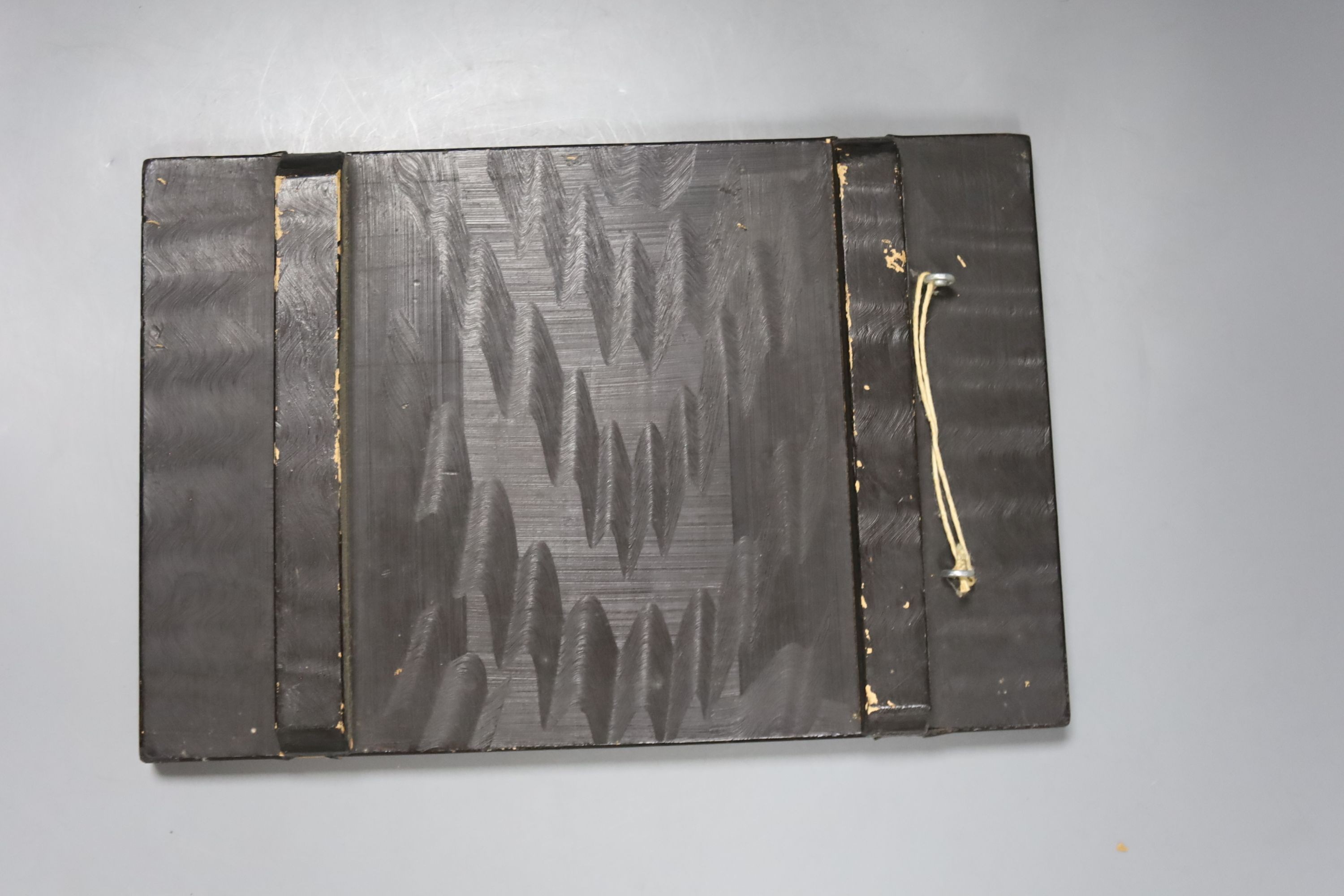 A Japanese ivory and bone inlaid lacquer panel of an immortal, late 19th century, 30x20cm